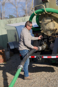 Septic pump technician working